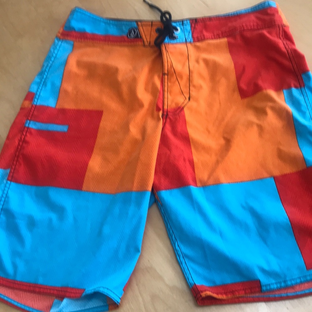Volcom swim trunks size 33 orange and turquoise great‎ condition